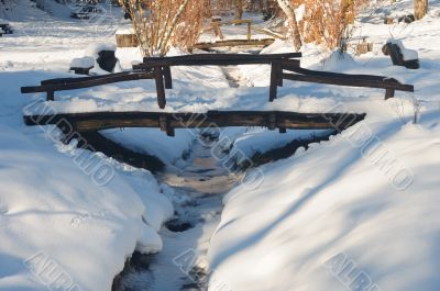 Wooden bridge and brook