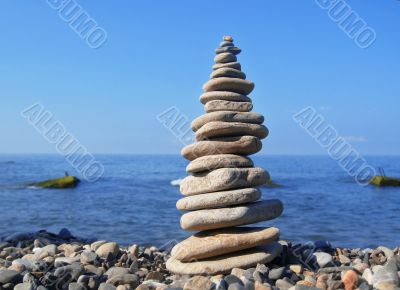 Balanced stones on the seashore