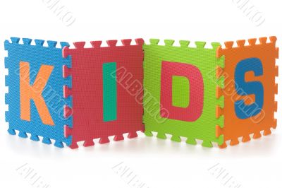 Kids - sign with alphabet puzzle letters isolated on white