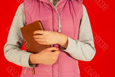 Female staying with a book