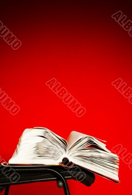Open book laying on the chair