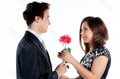 man gives a woman flowers