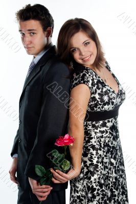 man gives a woman flowers
