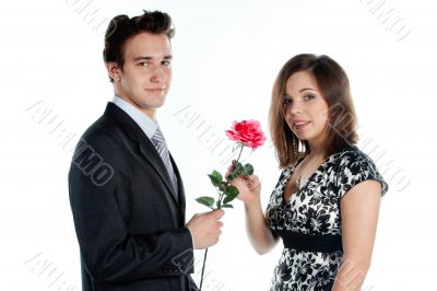 man gives a woman flowers