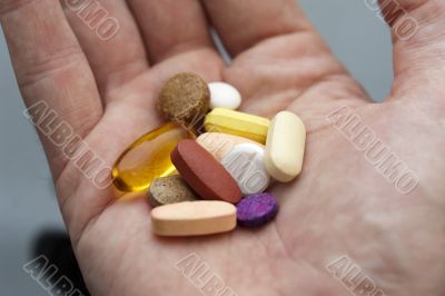 Hand Holding Drug Cocktail