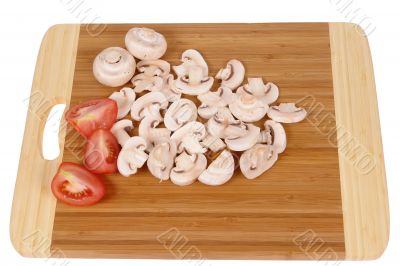 mushrooms on chopping board 
