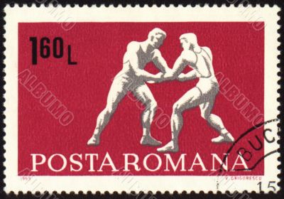 Wrestling on post stamp