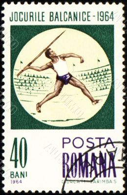 Javelin throwing on post stamp