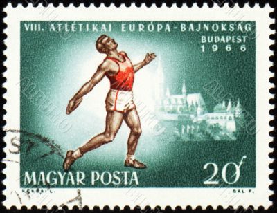 Running sportsman on post stamp