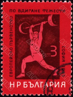 Heavy athletics on post stamp