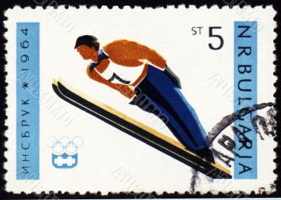 Ski jumping on post stamp