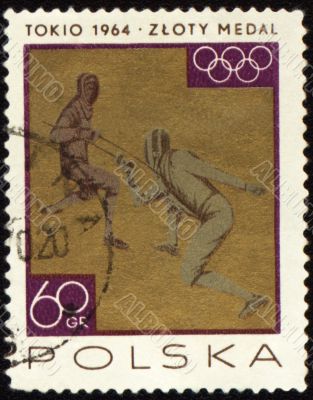Two fighting fencers on post stamp