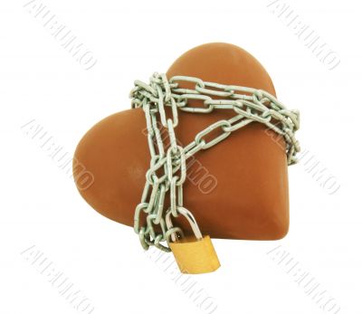 Heart shaped chocolate tied up with chains