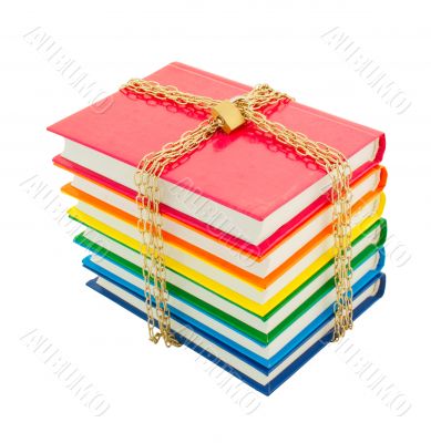 Colorful books tied up with chains