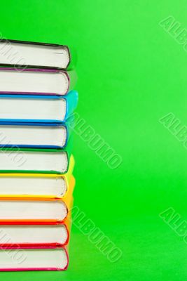 Stack of books` spines 