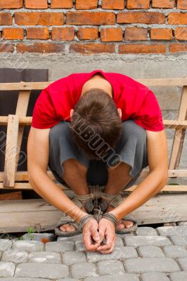 Man tied up with rope