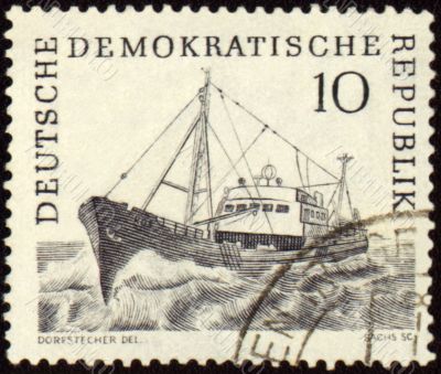 Ship at sea on post stamp