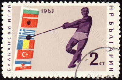 Athlete with hammer on post stamp