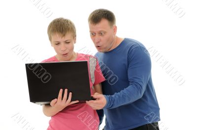  father and  son with laptop