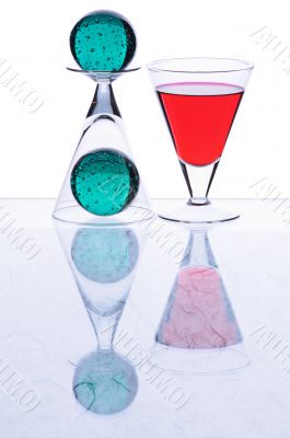 Wineglasses with green sheres