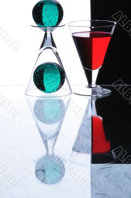 Wineglasses with green sheres