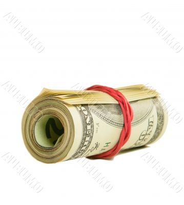 Roll of US dollars tied up with rubber