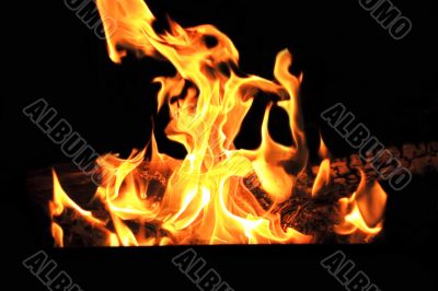 Red flame on the black background
