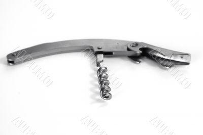Corkscrew on white table