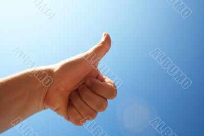 show positive signs with hand-