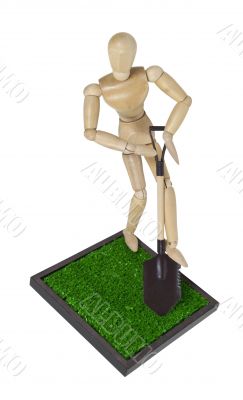 Digging With a Shovel into the Grass