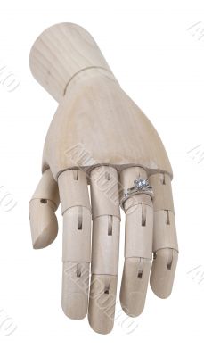 Diamond Engagement Ring On a Wooden Hand