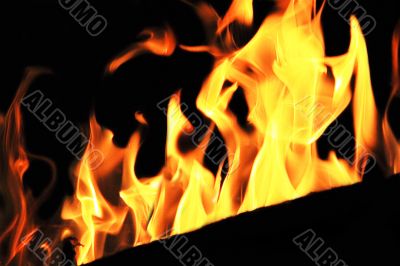 Red flame on the black background
