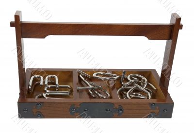 Wooden Tray Filled with Metal Puzzles