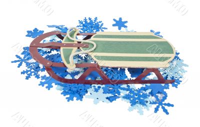 Sled on a Bed of Colorful Snowflakes