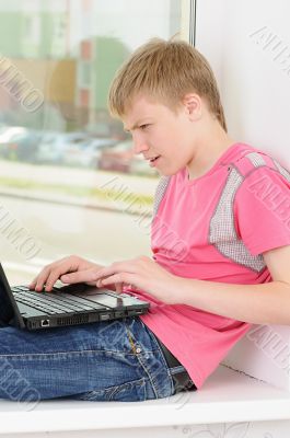 teenager with laptop