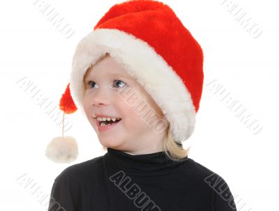 The child in a hat santa claus