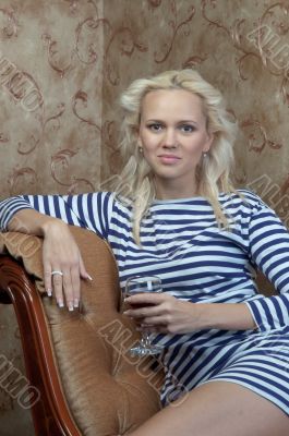 A girl with a glass of wine