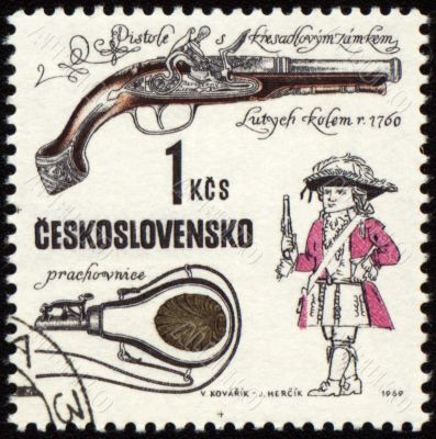 Ancient pistol on post stamp