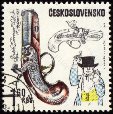 Ancient pistol on post stamp