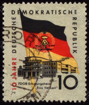 State flag of GDR (East Germany) on post stamp