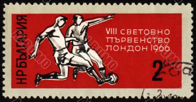 Football players on post stamp