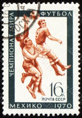 Football players on post stamp