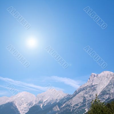 the sun in the mountain country
