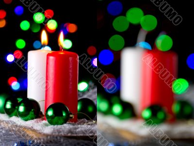 Red and white candle with a green New Year`s ball