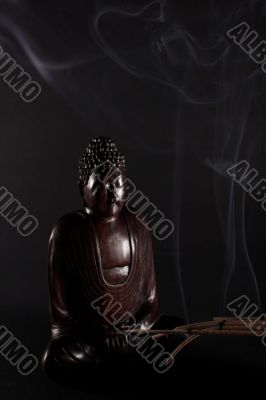 Buddha on black background