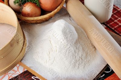 Cooked meal for baking and other ingredients on the table