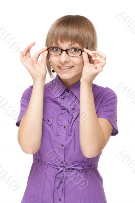 Young girl in violet blouse and spectacles