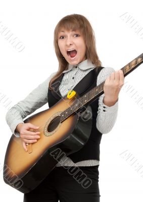 Girl with guitar in hand expressive sings
