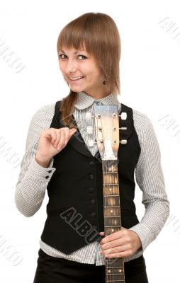 Young girl with guitar in hand