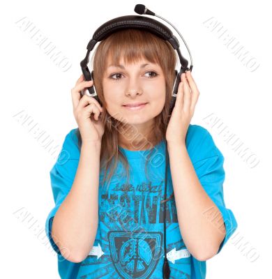 Girl in earphone smiles, portrait
